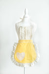 A Vintage Darling apron in yellow