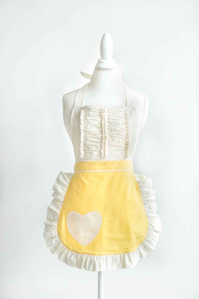 A Vintage Darling apron in yellow